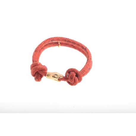 <p>Leather bracelet with snake print and 18k gold plated snake head ornament.</p>
<p>The size is adjustable with the sliding knot.</p>