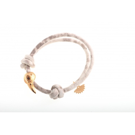 <p>White light python  leather bracelet with 18k gold plated bird skull ornament.</p>
<p>The size is adjustable with the sliding nest.</p>
<p></p>